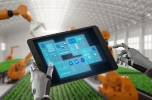 Avenir futuristique de l'industrie agroalimentaire. Robots et ipad pour la gestion